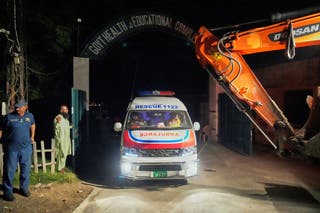 An ambulance leaves the Government Health and Education Complex, located close to the site of a suspected Indian missile attack, in Muridke, a town in Pakistan's Punjab province, Wednesday, May 7, 2025